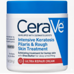 CeraVe white jar with blue lid and label for Intensive Keratosis Pilaris and Rough Skin Treatment. The label shows 19 oz size and features a red banner with skin icon for Ultra Repair Cream with Shea Butter.